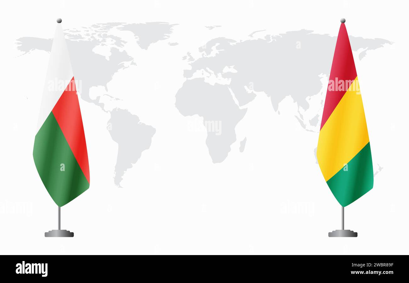 Madagaskar und Guinea Flaggen für offizielle Treffen vor dem Hintergrund der Weltkarte. Stock Vektor