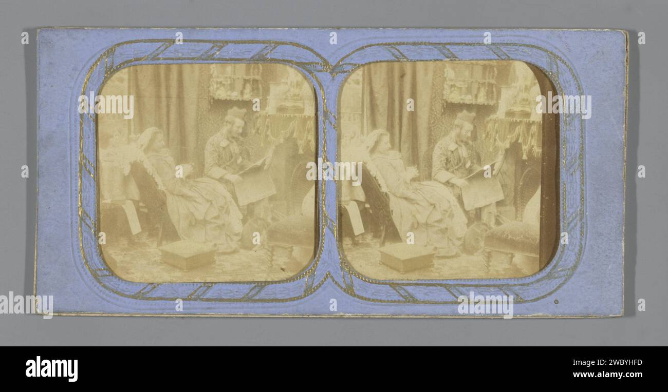 Mann und Frau im Wohnzimmer, Mann liest die Zeitung, Anonym, 1855 - 1875 Gewebestereographie fotografischer Support. Papier. Ablesung des Albumendrucks aus Pappe Stockfoto