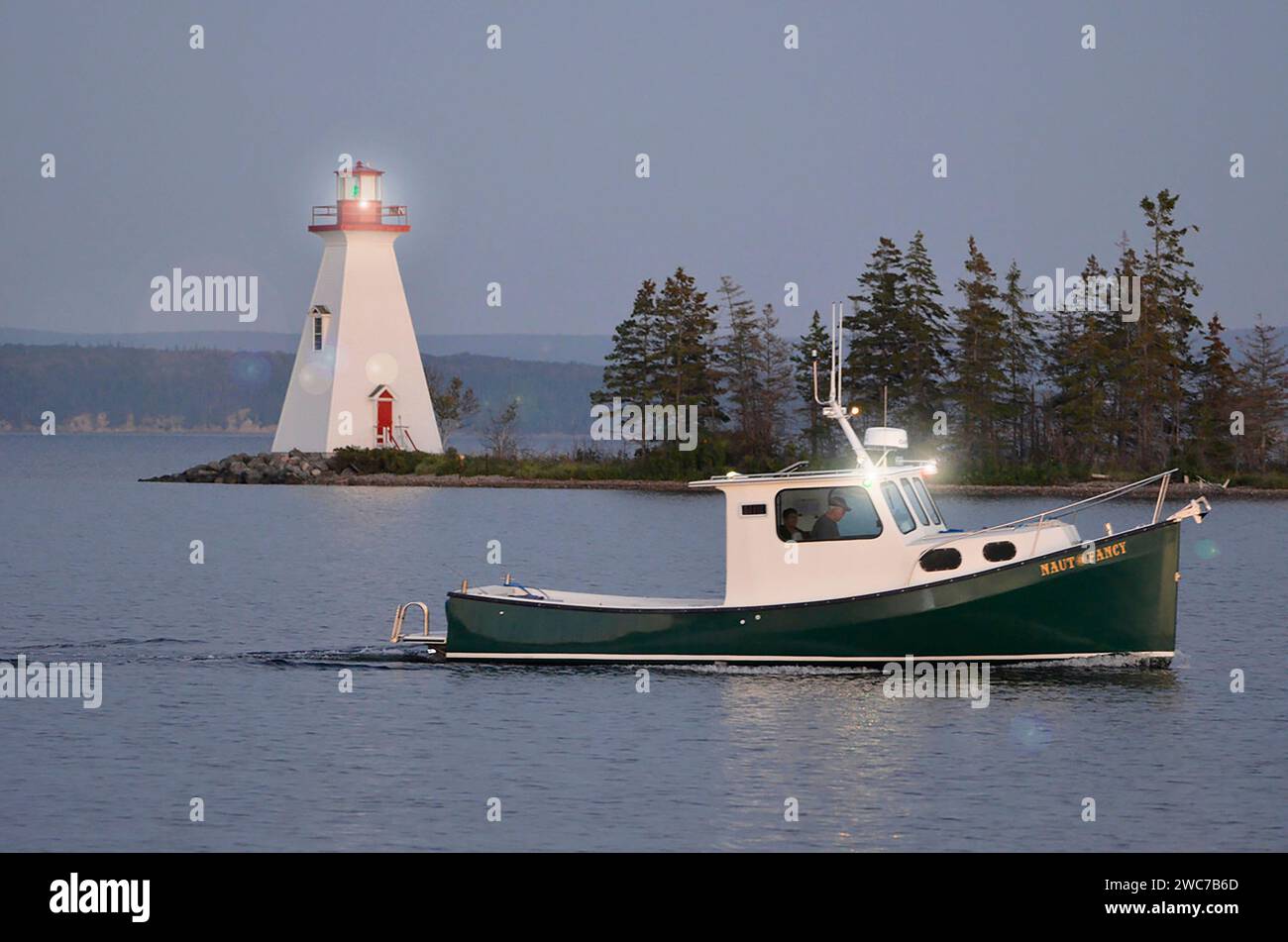 Kidston Island Lighthouse, Dämmerung in Baddeck, NS Stockfoto