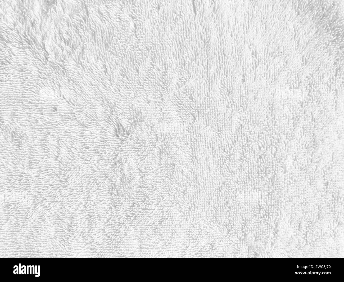 Weißer Stoffhintergrund, der die exquisite Textur der Seide zeigt. Kopierbereich für Konstruktion Stockfoto