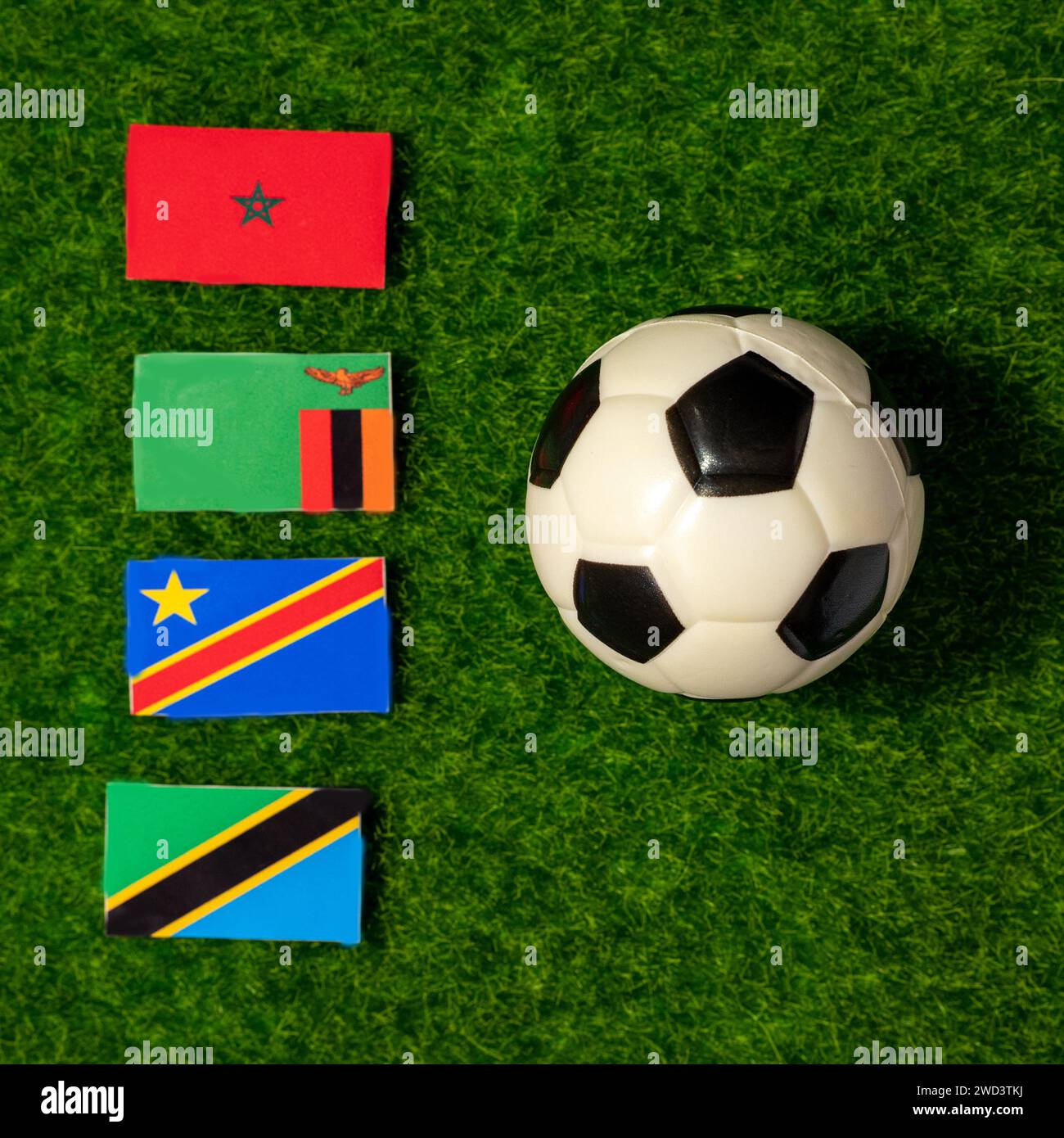 Flaggen der Teams, die an der Gruppe F des Afrikanischen Völkercups 2024 teilnehmen. Marokko, Sambia, DR Kongo, Tansania. Stockfoto