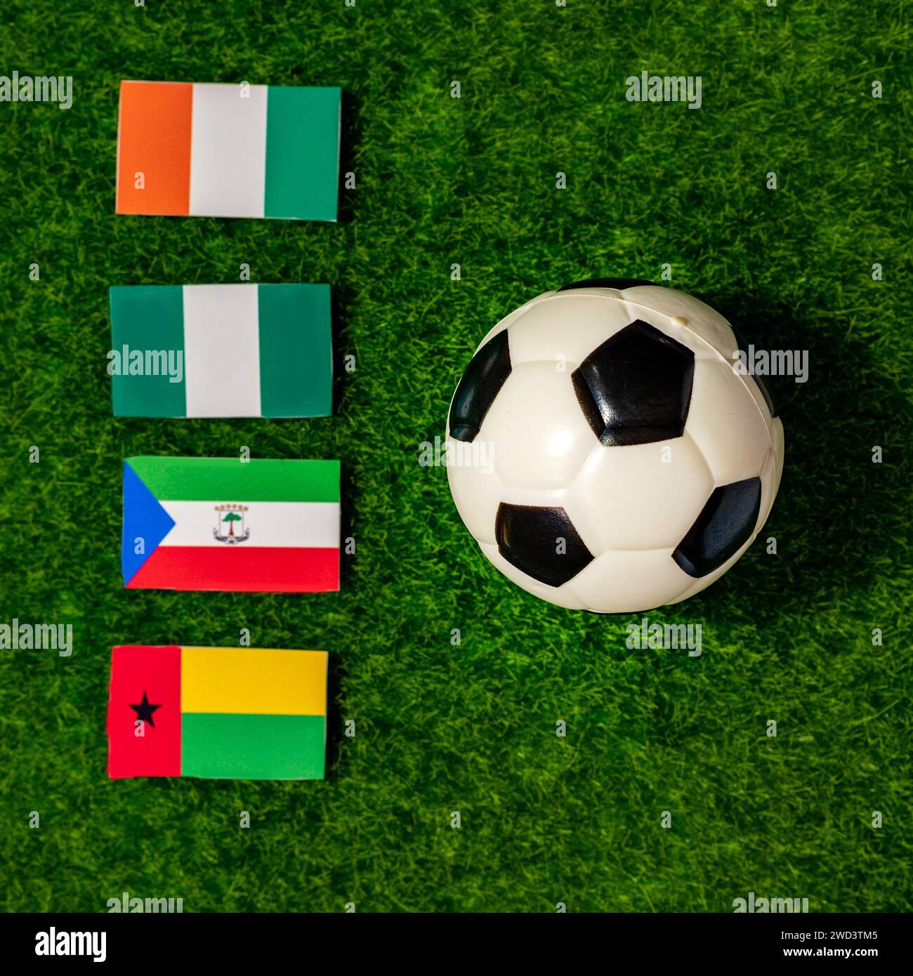 Flaggen der Teams, die an der Gruppe A des Afrikanischen Völkercups 2024 teilnehmen. Äquatorialguinea, Elfenbeinküste, Nigeria, Guinea-Bissau. Stockfoto