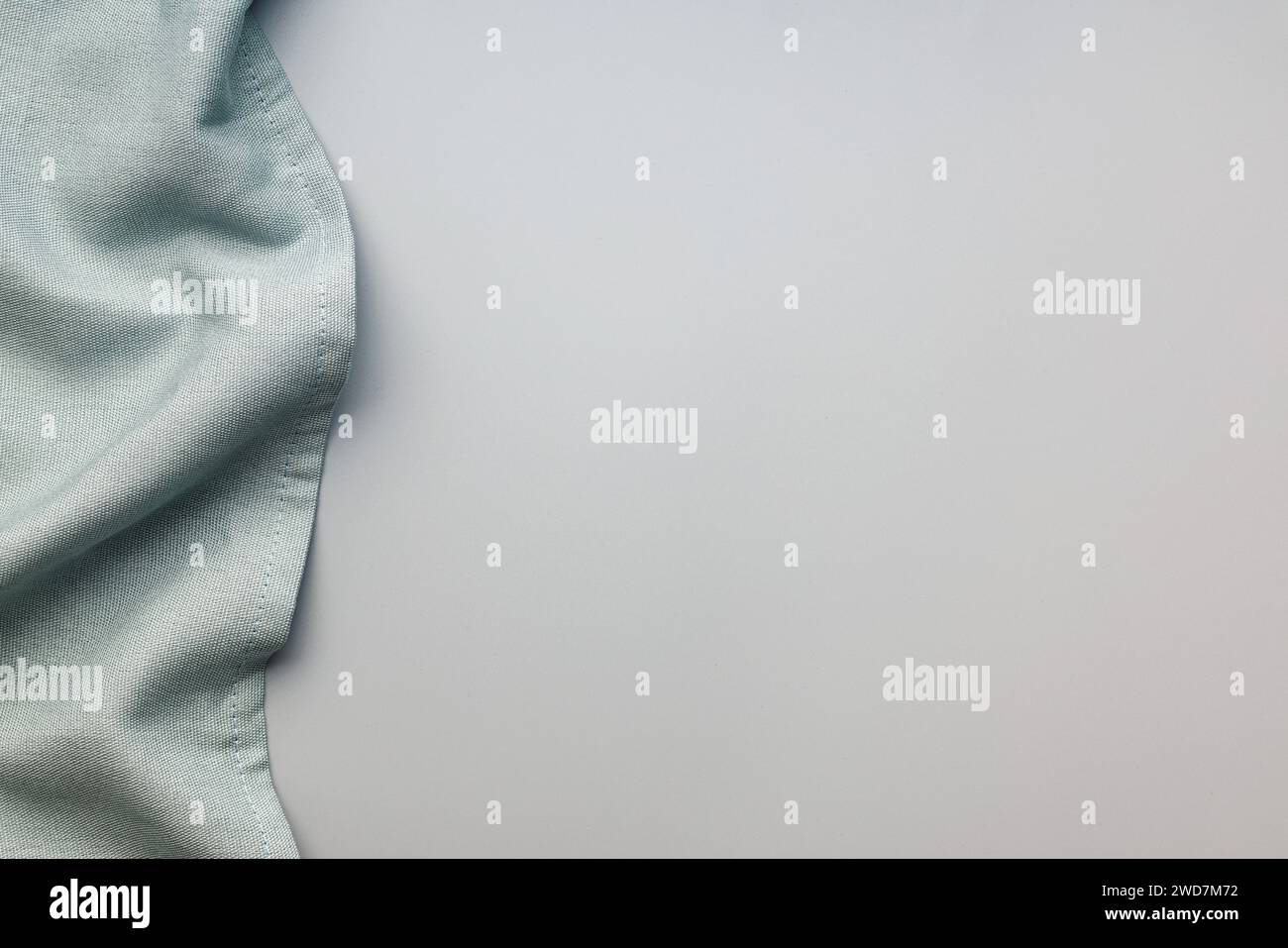 Hintergrund mit Tischdecke auf dem grauen Tisch. Stockfoto