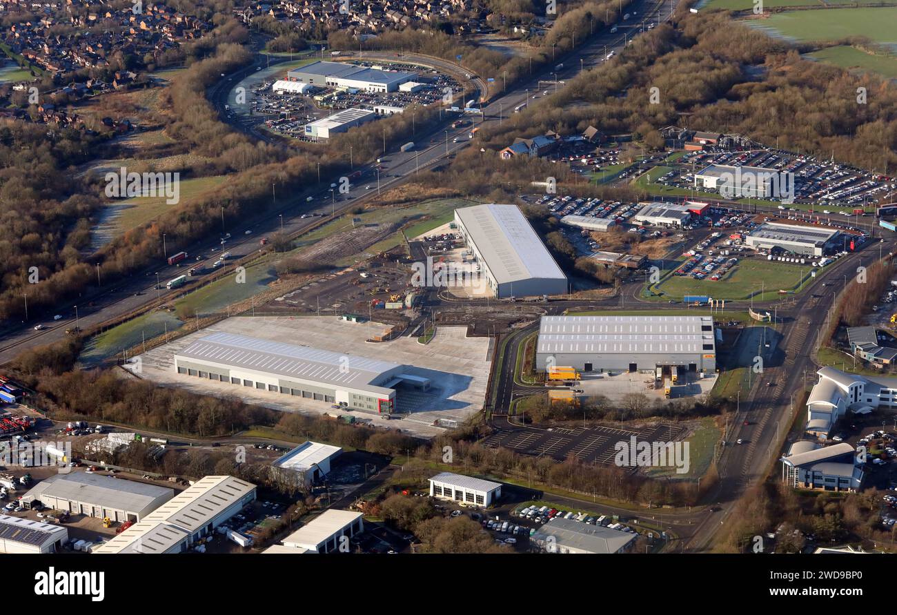 Aus der Vogelperspektive eines neuen Industrieparks am Trefoil Way, an der Anschlussstelle 31a der Autobahn M6 in Preston, Lancashire Stockfoto