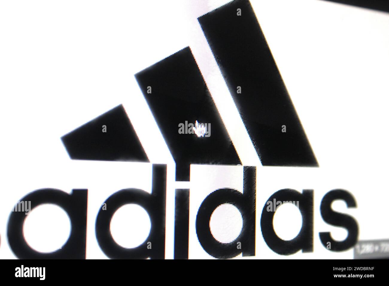 Ein Foto des Adidas-Logos auf einem Computerbildschirm. Stockfoto