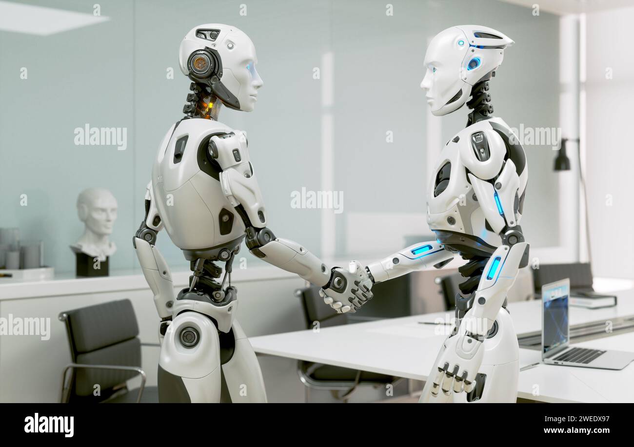 Der Roboter schüttelt mit einem anderen in einem Büro die Hand Stockfoto