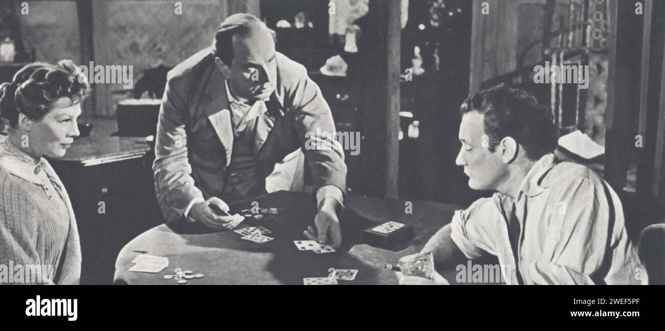 Robert Morley, Trevor Howard und Wendy Hiller spielen die Hauptrollen in „Outcast of the Islands“ (1951), einem britischen Abenteuerdrama. Regie führte Carol Reed, der Film ist eine Adaption von Joseph Conrads Roman. Trevor Howard spielt Peter Willems, einen verehrten und moralisch schwachen Mann, der in einen entfernten Handelsposten im malaiischen Archipel verbannt wird. Morley stellt Captain Lingard dar, der Willems eine Chance auf Wiedergutmachung gibt, und Hiller spielt Mrs. Almayer, eine Figur, die in der Komplexität der Situation gefangen ist. Stockfoto