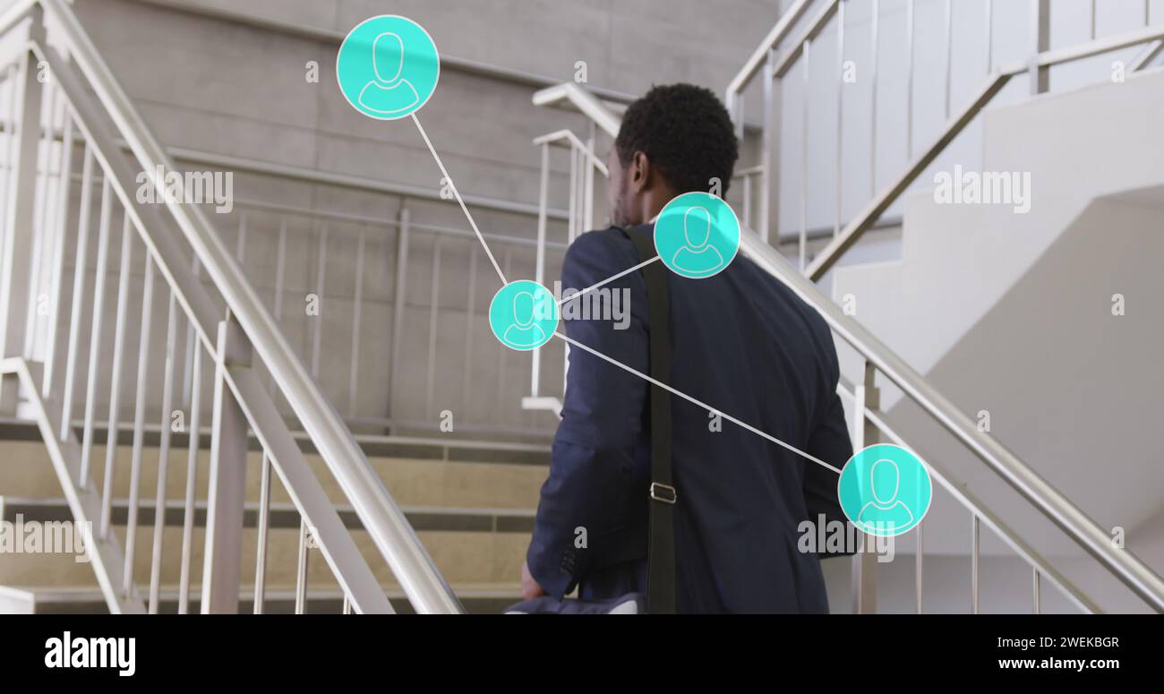 Bild von Verbindungen zur Datenverarbeitung über afroamerikanischen Geschäftsmann im Büro Stockfoto