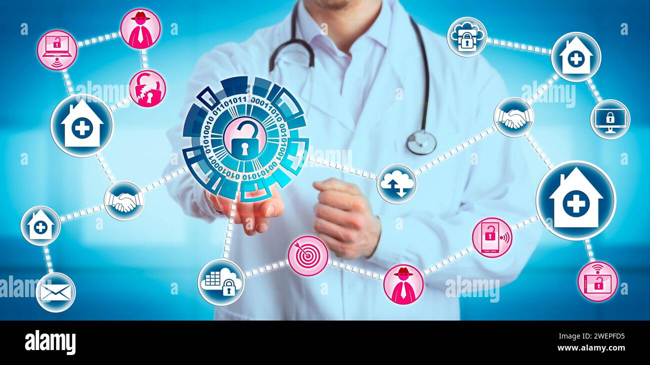 Junge männliche Ärzte, die Daten austauschen, sind durch Zusammenschlüsse und Übernahmen medizinischer Praxen den Netzwerkschwachstellen ausgesetzt. IT-Konzept für Computer Stockfoto