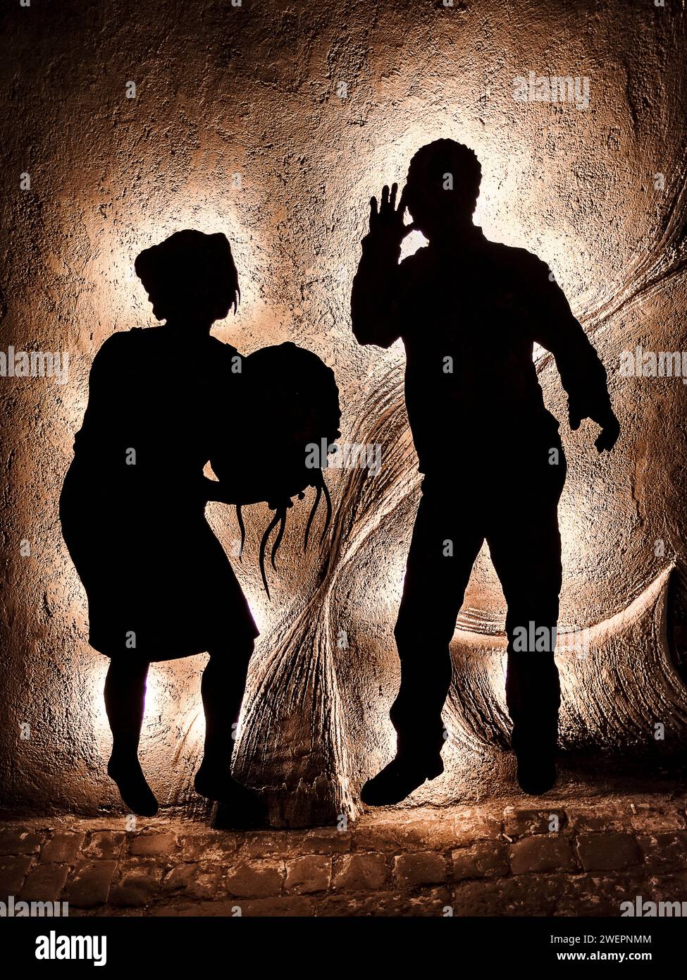 Eine künstlerische Darstellung aus Licht und Schatten von zwei Gesprächspartnern Stockfoto