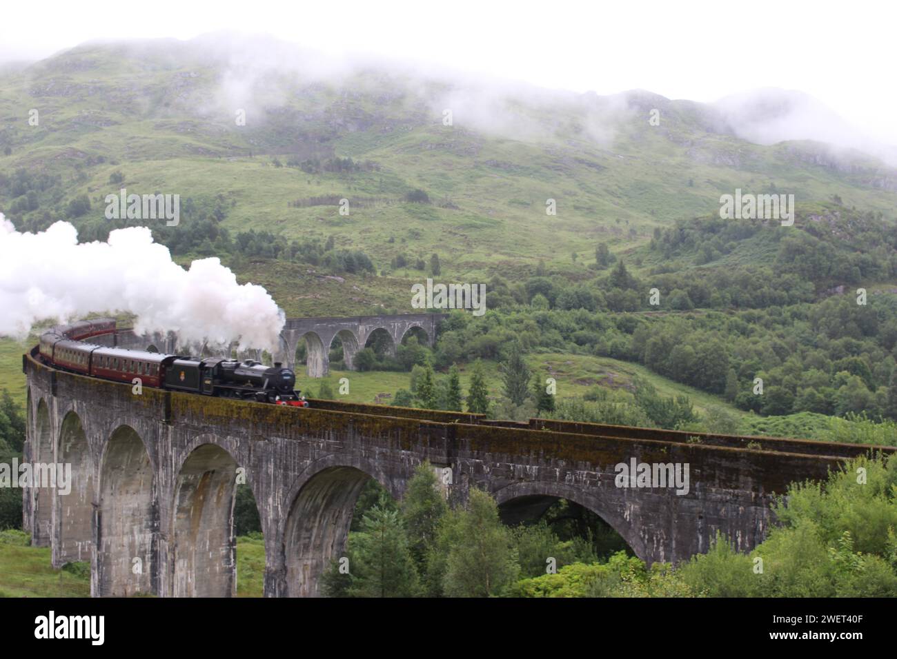 Jacobite Train auf dem Glenfinnan Viadukt, Schottland Stockfoto