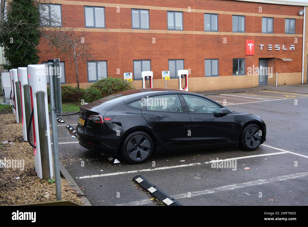 Tesla, Modell,3, Laden, elektrisch, Auto, Fahrzeug, EV, grün, Technologie, Lysander Rd, Patchway, Bristol, BS10 7DD, GB, UK, England, Stockfoto