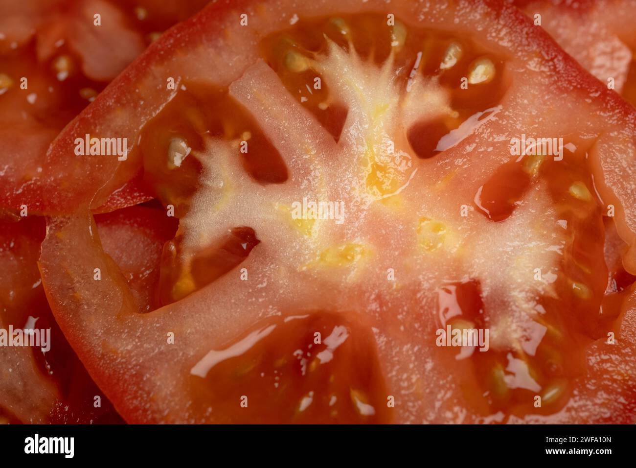 Macro Food Shot aus Rindfleischtomate Stockfoto