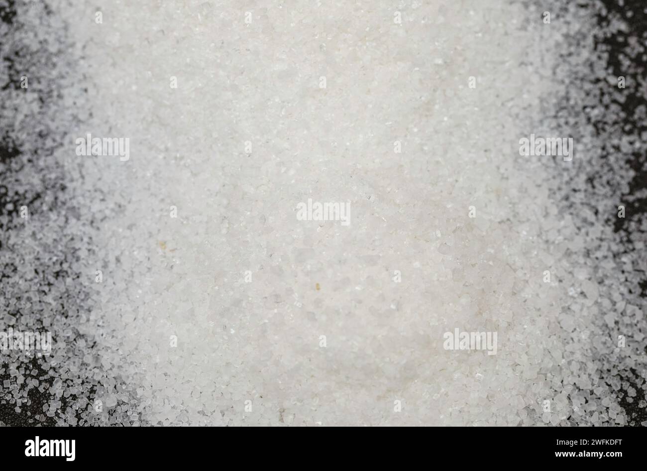 Zucker in Feinkristallen in Nahaufnahme Stockfoto
