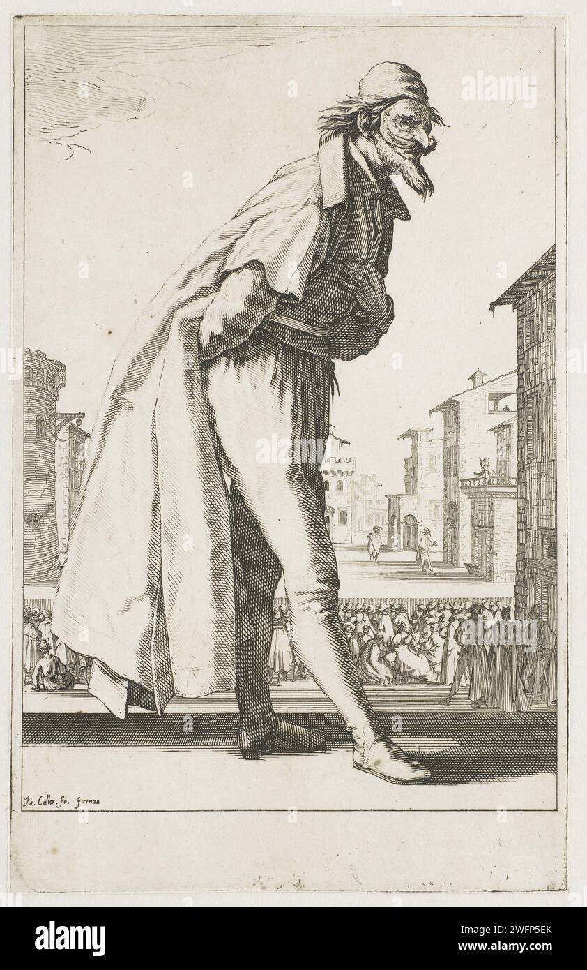 Hosen, Jacques Callot, 1619 Druck im Vordergrund ein Schauspieler, der eine Figur aus der italienischen Commedia dell'arte (Hose) vorschlägt, hinten, gekleidet in einem langen Mantel und mit einer Maske, die eine leichte Schleife macht. Im Hintergrund kann man sehen, wie diese Hose seine Rolle auf der Bühne für das Publikum spielt. Unter wird ein leerer Rand angezeigt. Dieser Druck ist Teil einer Serie von drei Abzügen mit Commedia dell'arte-Figuren. Florenz Papierätzungen / Gravurtypen in 'commedia dell'arte': Pantalone. Porträt des Schauspielers, der Schauspielerin. Gruppe von Schauspielern, Truppe; Schauspieler auf der Bühne Stockfoto