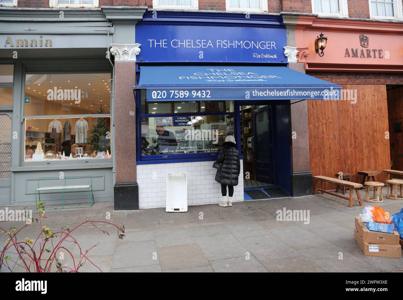 Der Chelsea Fischhändler und eine Parade der Geschäfte Cale Street Chelsea London England Stockfoto