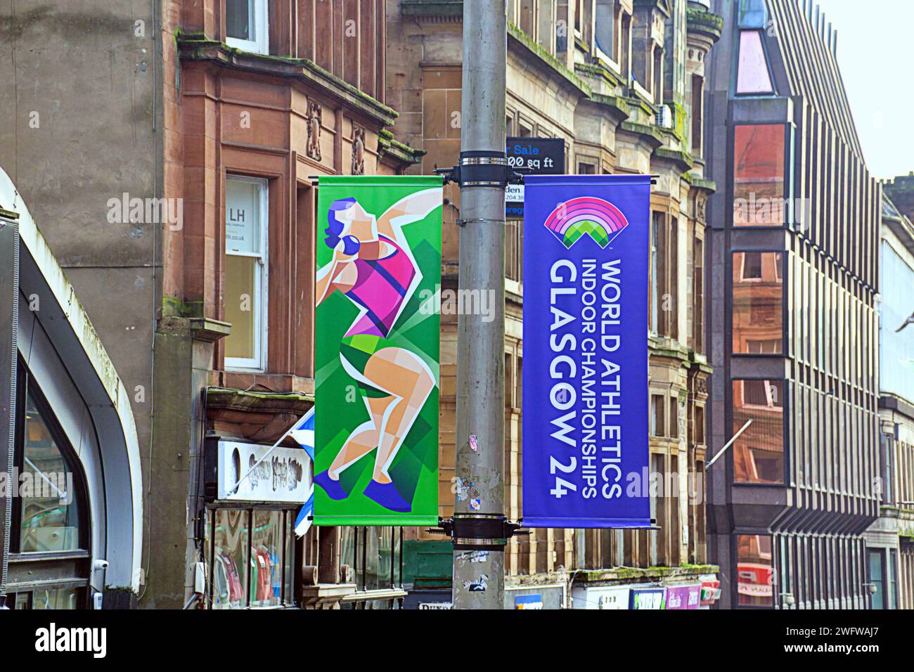 Glasgow, Schottland, Großbritannien. Februar 2024. Glasgow bereitet die erste Einführung für die Hallenathletik-Weltmeisterschaften in der Stadt vor, indem es Banner auf der Style Mile und auf dem george Square im Stadtzentrum von Credit Gerard Ferry/Alamy Live News einführt Stockfoto