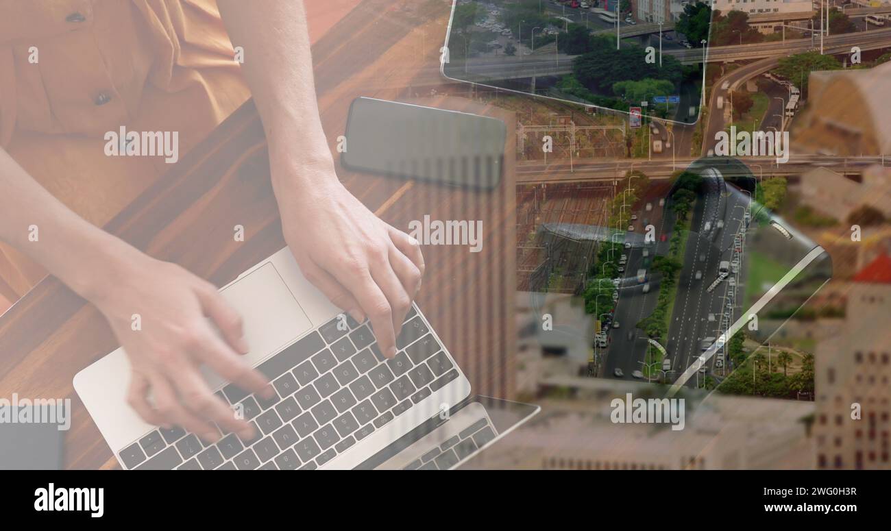 Bild einer kaukasischen Geschäftsfrau mit Laptop über Stadtbild Stockfoto