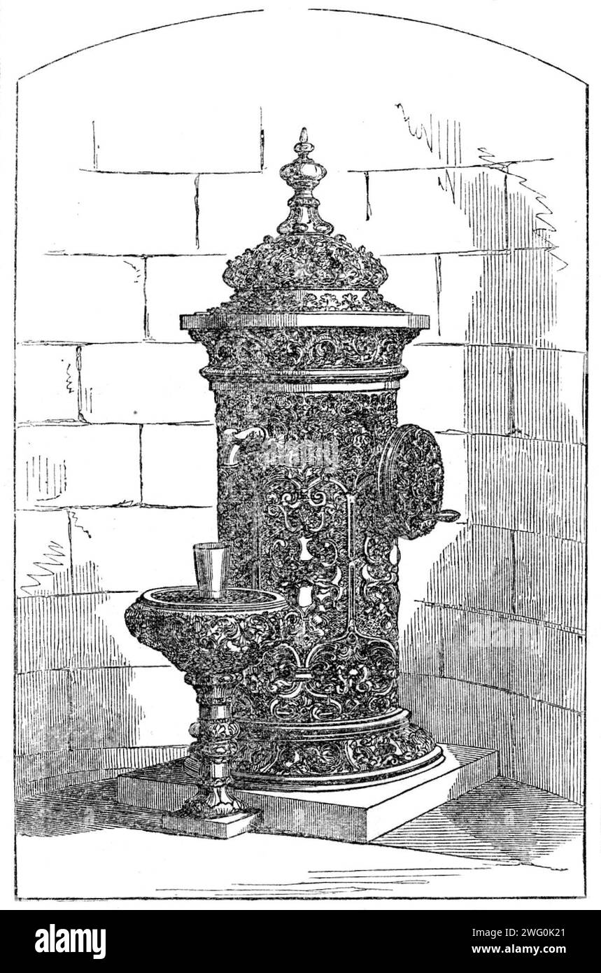 Neuer Trinkbrunnen in Bowness, Windermere, 1862. "Wir präsentieren unseren Lesern eine Gravur eines eigenartigen Trinkbrunnens, die den Besuchern und Bewohnern von Bowness, Windermere, von Joseph Livesey, Esq., aus Preston, präsentiert wurde. der der Stadt Preston acht Trinkbrunnen schenkte. Es liegt an der viel frequentierten und schönen Promenade vor dem Windermere Lake und bildet neben seiner Funktion als Trinkbrunnen ein Ornament von nicht unerheblicher Attraktion. Wir glauben, das ist der erste Brunnen mit mechanischer Anordnung, um das Wasser aus einem niedrigen Niveau zu heben Stockfoto