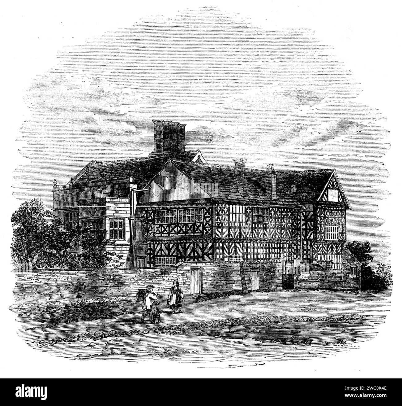The Hall-i'-Th'-Wood, nahe Bolton, die Residenz von Samuel Crompton, wo er 1862 das Spinning-Maultier erfand. "Die Überreste vieler alter Bäume, die bis zu ihren Wurzeln abgehauen wurden, und nur sehr wenige Exemplare von feinem Holz, die noch stehen, zeigen, dass der Name des Herrenhauses zu einem Zeitpunkt völlig passend war... das Gebäude ist von beträchtlicher Größe und wurde in zwei verschiedenen Zeiträumen errichtet. ein Teil - die Materialien sind Eichenholz, das phantasievoll angeordnet ist, mit Putz gefüllt, im Stil, der gewöhnlich als „Pfosten und Gips“ bezeichnet wird - kann so alt sein wie das Ende des 15. Jahrhunderts Stockfoto