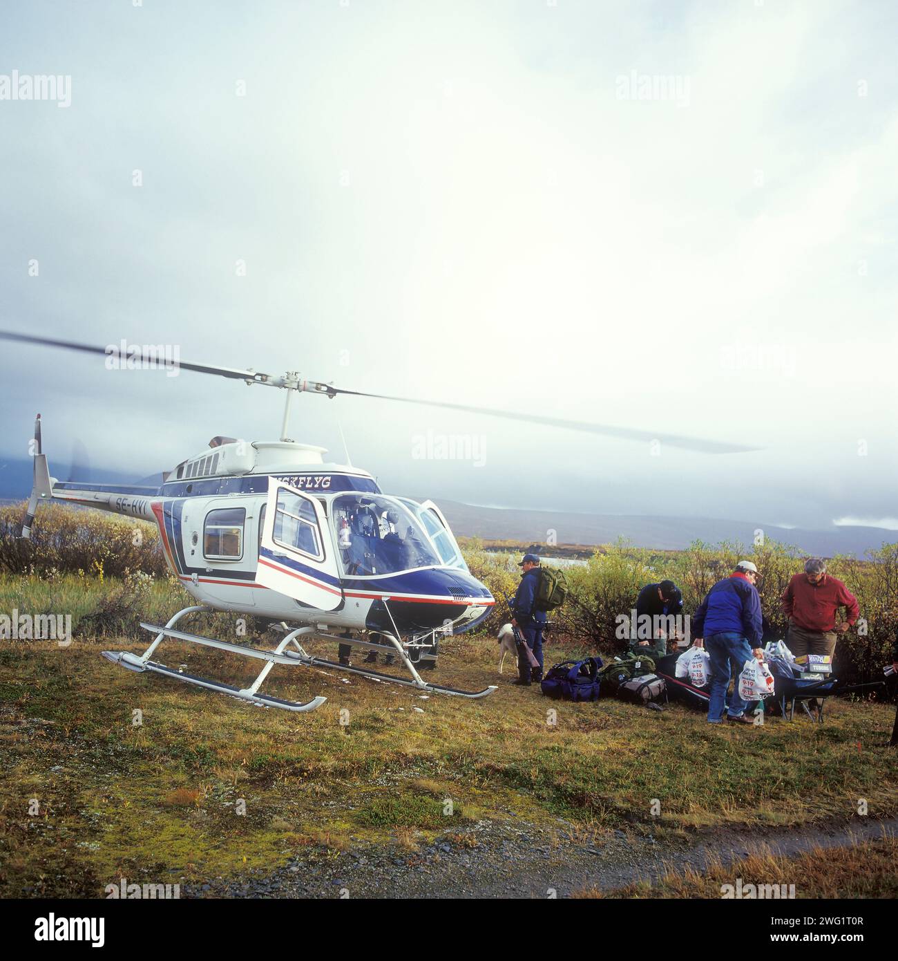 Hubschraubertransport zu den Fischereigewässern. Laponia, Schweden Stockfoto