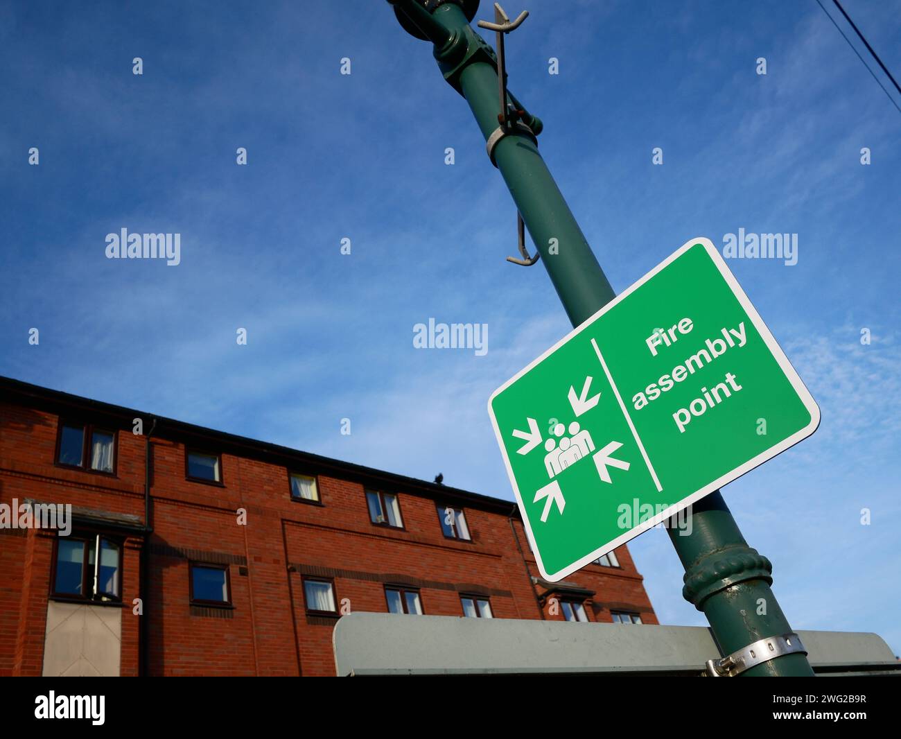 Versammlung Punkt Feuerzeichen Stockfoto