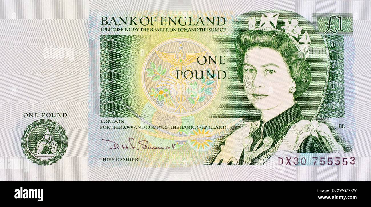 Nahaufnahme einer Banknote der Bank of England mit einem Porträt einer jungen Königin Elisabeth der 2., dem Geldwert und der Unterschrift des Chefkassierers. Stockfoto