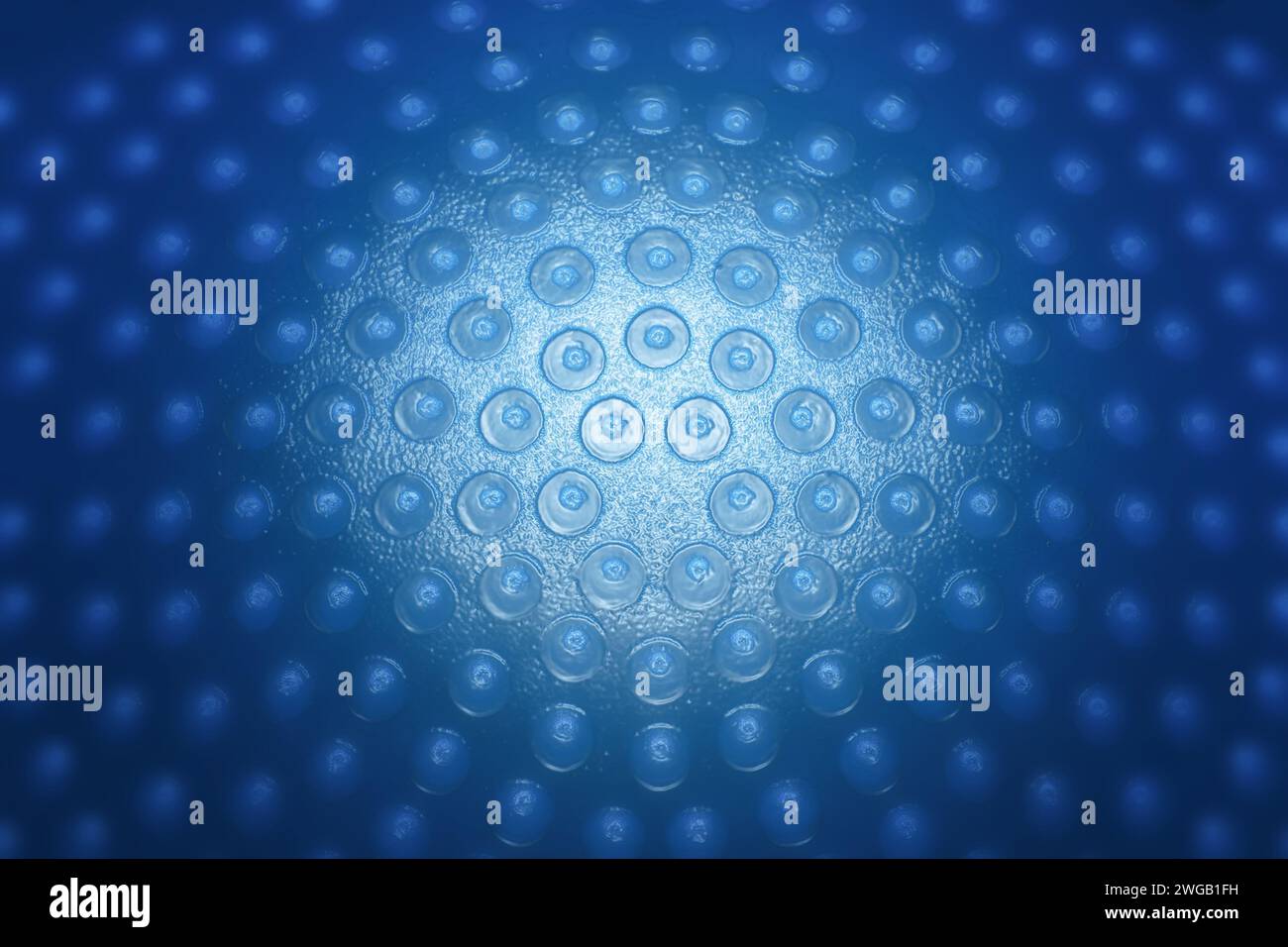Blauer abstrakter Hintergrund mit Punkten und hervorgehobener Mitte, bis an die Bildränder abwaschen. Stockfoto