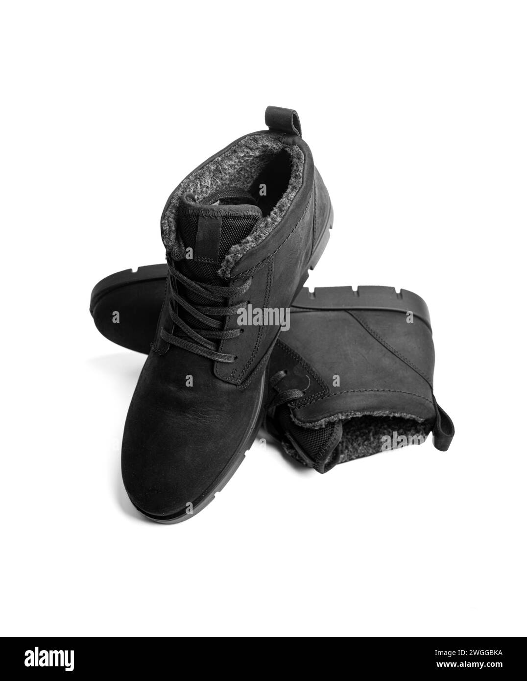 Ein Paar Winterschuhe für Damen, isoliert auf einem weiß. Stockfoto