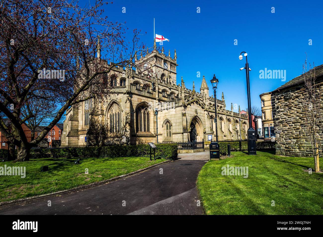 Die All Saints Church befindet sich im Stadtzentrum von Wigan und stammt aus dem Jahr 1100. Stockfoto