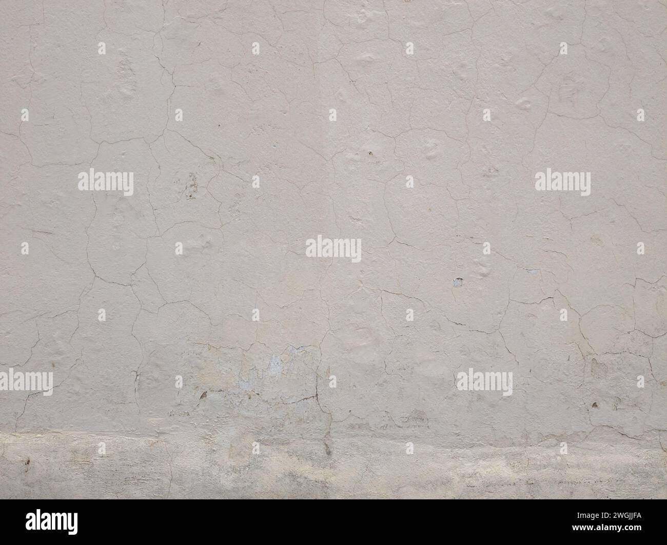 Zerrissene Zementwand-Alterung Stockfoto