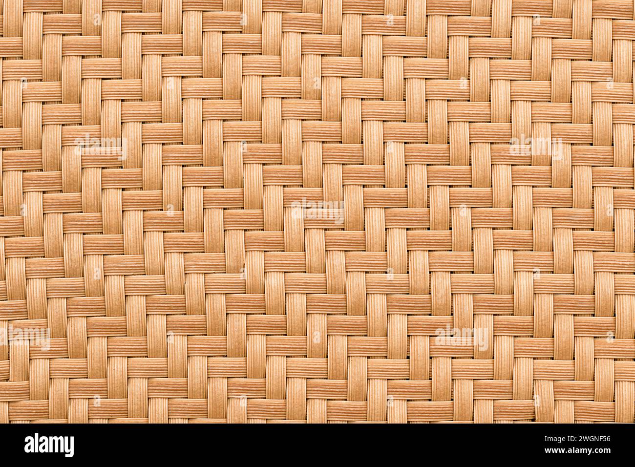 Künstliches Material. Brauner gewebter Hintergrund für die Herstellung von Gartenmöbeln und Innendekoration Stockfoto