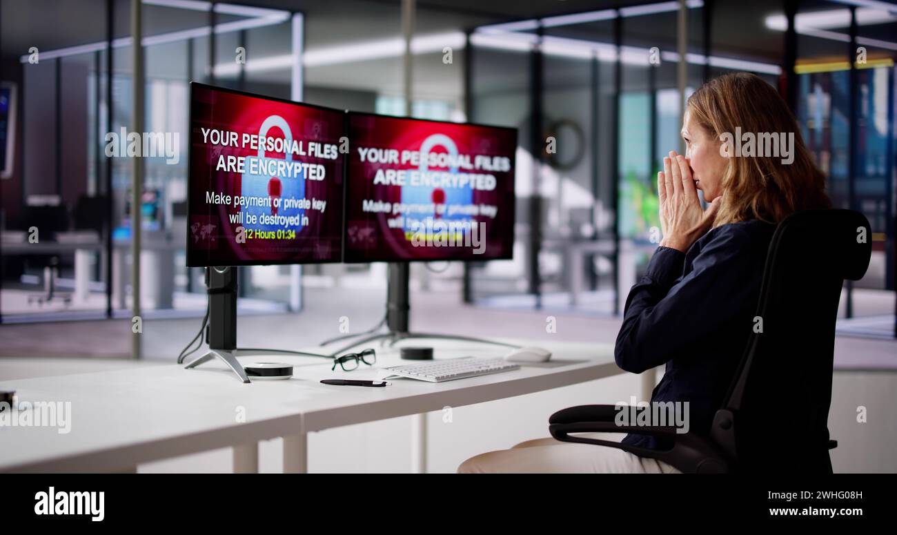 Ransomware-Malware-Angriff. Business-Computer Gehackt. Datenschutzverletzung Stockfoto