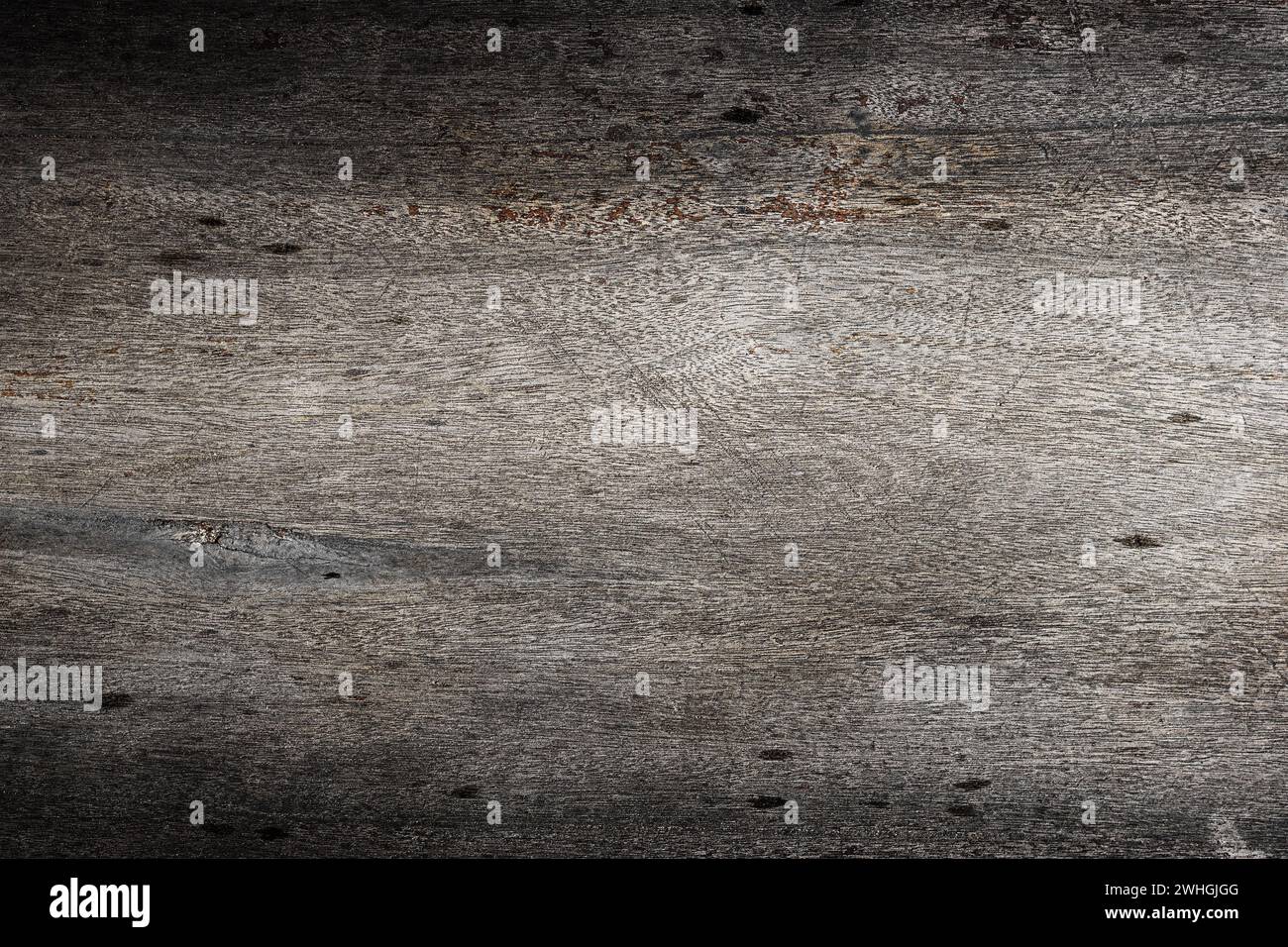 Dunkler alter Holzschreibtisch oder -Boden. Hintergrund mit Holzstruktur Stockfoto
