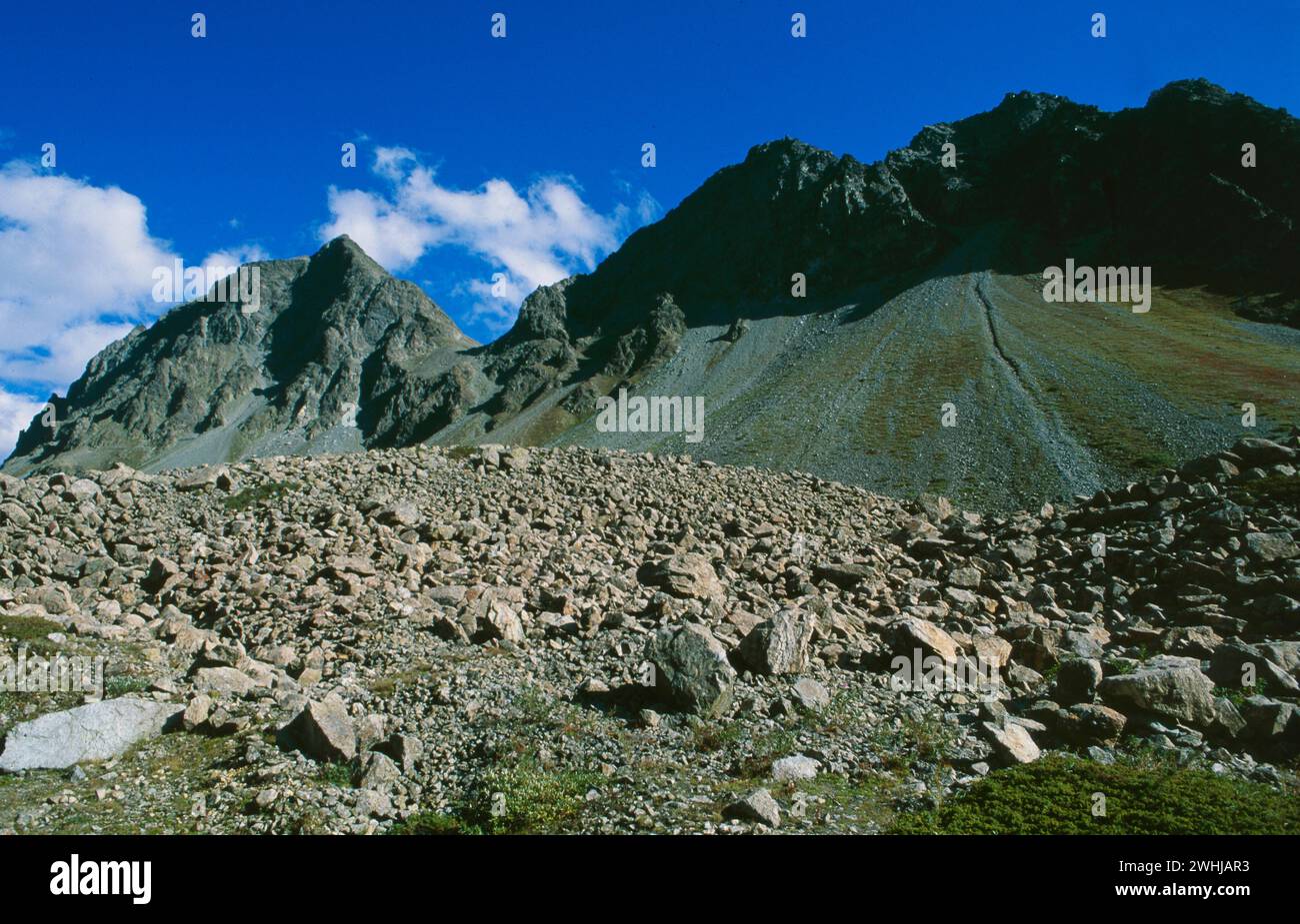 Die Steinschlaggefahr erhört sich in den Alpen durch den Klimawandel und den schmelzenden Permafrost | der globale clima-Wandel macht die alpen mehr und mehr Stockfoto