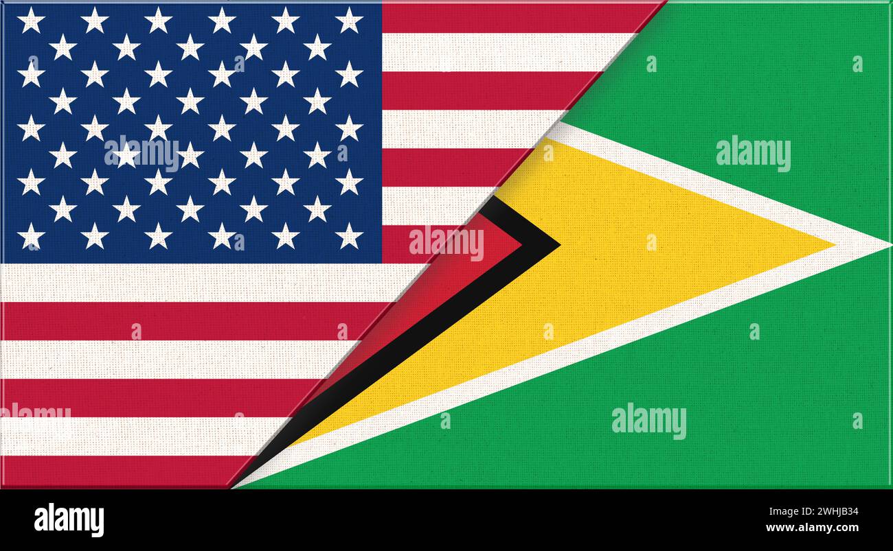 Flaggen von USA und Guyana. Diplomatische Beziehungen zwischen Amerika und Guyana. Nationalflaggen auf Stoffoberfläche Stockfoto