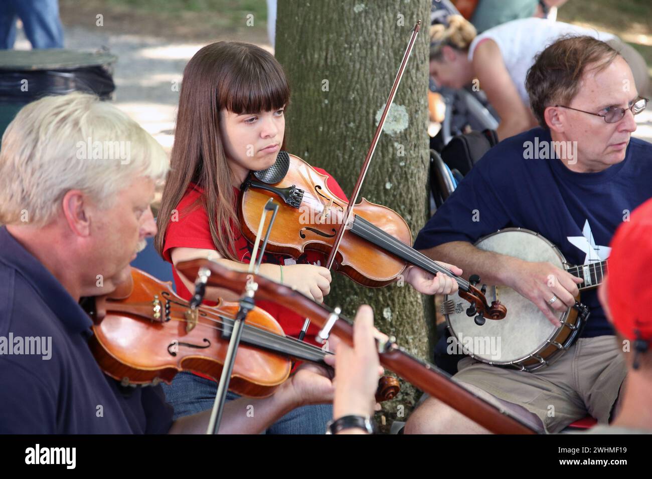 Fiddlers und Banjospieler Teil einer Musiker-Jam-Gruppe, Old Fiddlers Picknick Stockfoto