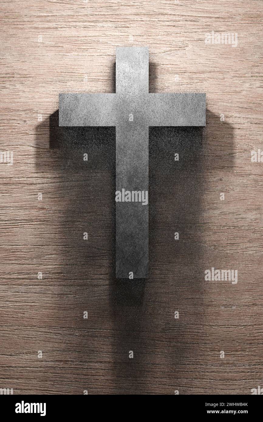 Aschenmittwoch. Verliehen. Religiöses Kreuz mit Asche auf hölzernem Hintergrund. Stockfoto