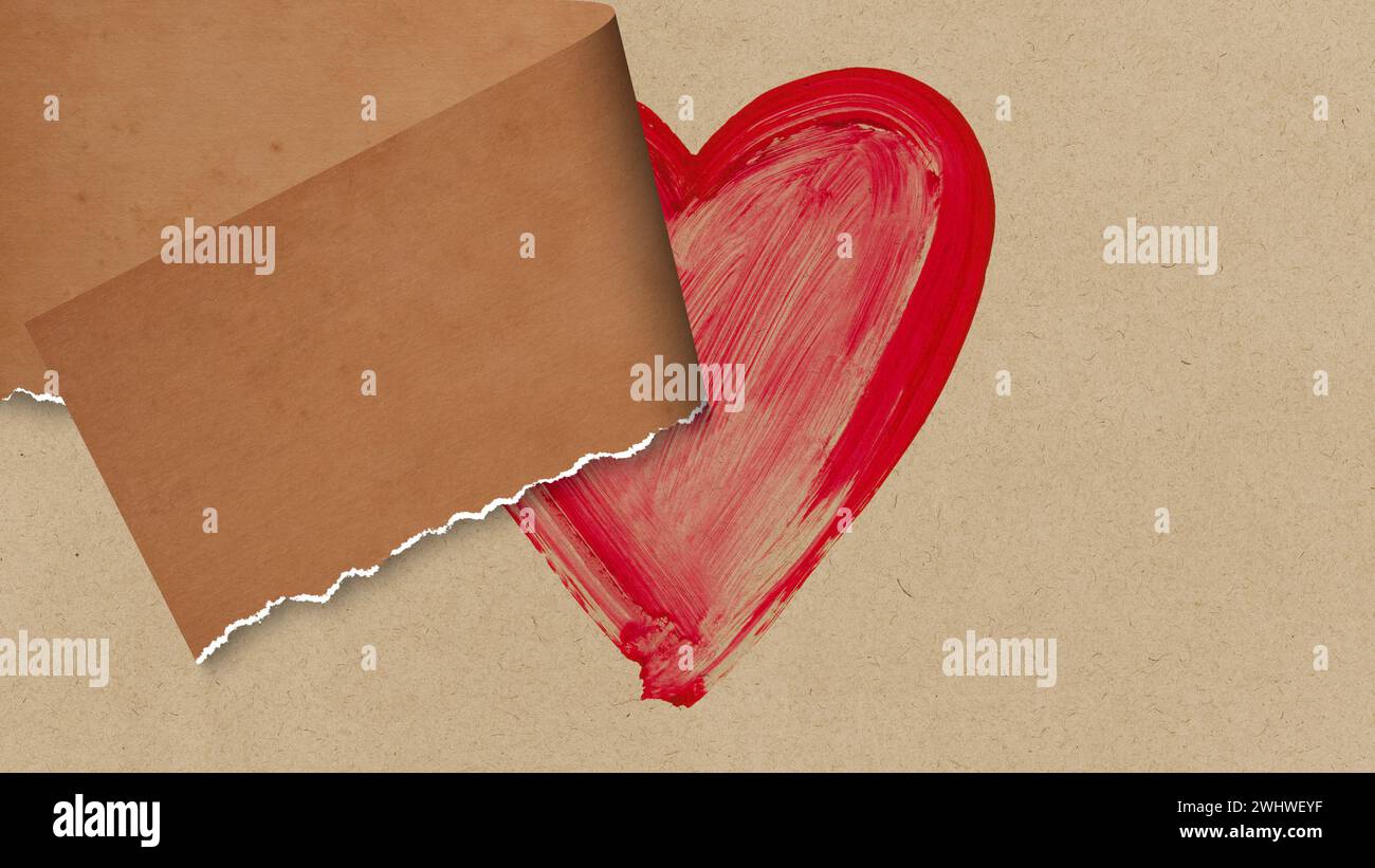 Ein gerissener Papierstreifen zeigt ein gemaltes Herz Stockfoto