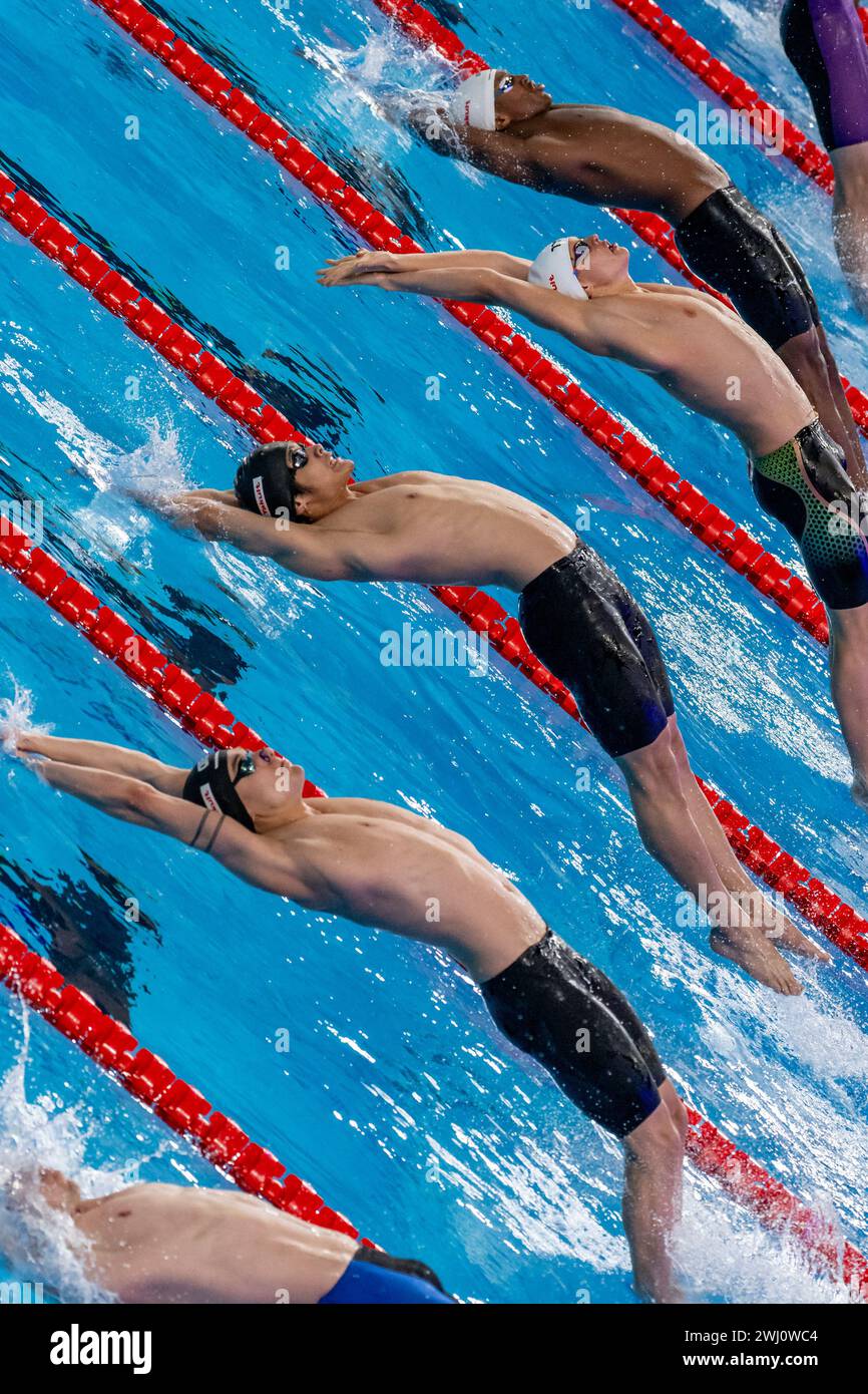 Doha, Katar. Februar 2024. Starten Sie die 3. Hitze des Schwimmens 100 m. Rückschläge bei den 21. Aquatikweltmeisterschaften im Aspire Dome in Doha (Katar), 12. Februar 2024. Quelle: Insidefoto di andrea staccioli/Alamy Live News Stockfoto