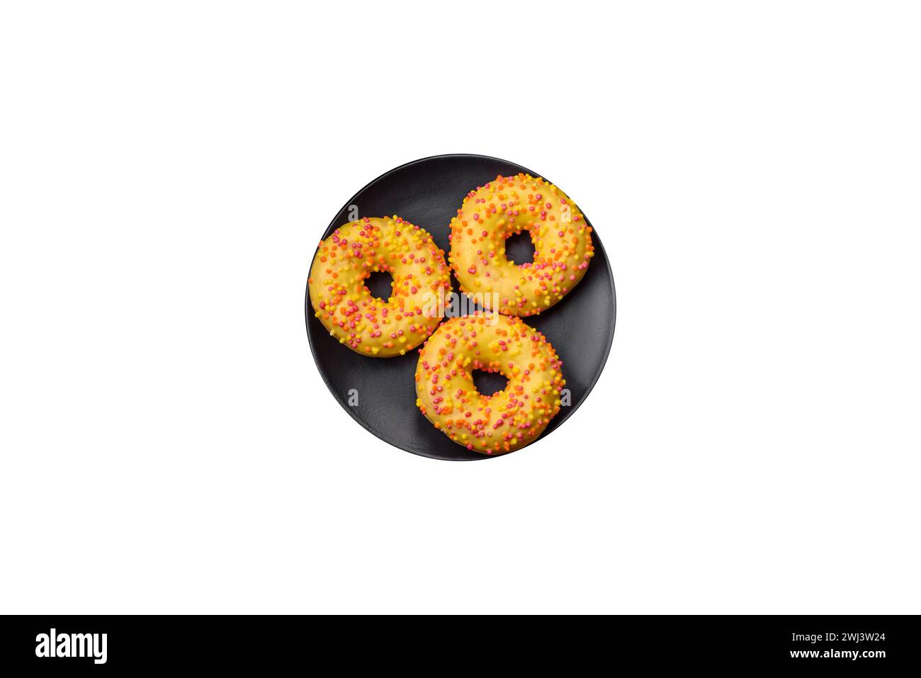 Köstliche frische Donuts in gelber Glasur mit Zitronenaroma Füllung Stockfoto
