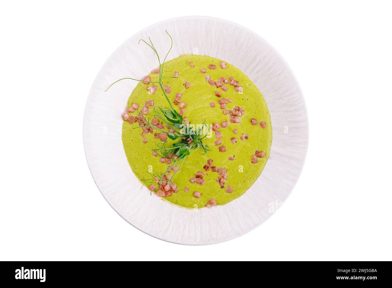 Gesunde grüne Suppe auf weißem Teller Stockfoto