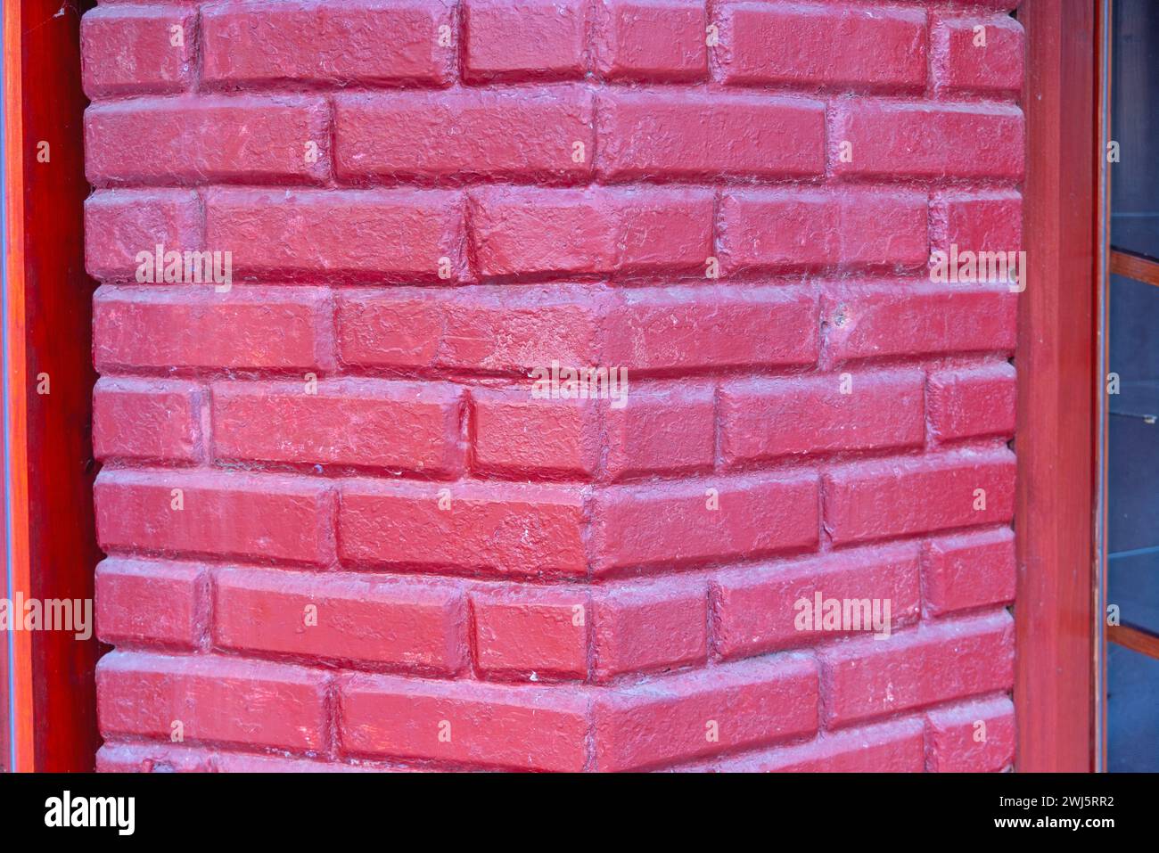 Red Bricks Column Support in House Corner Stockfoto