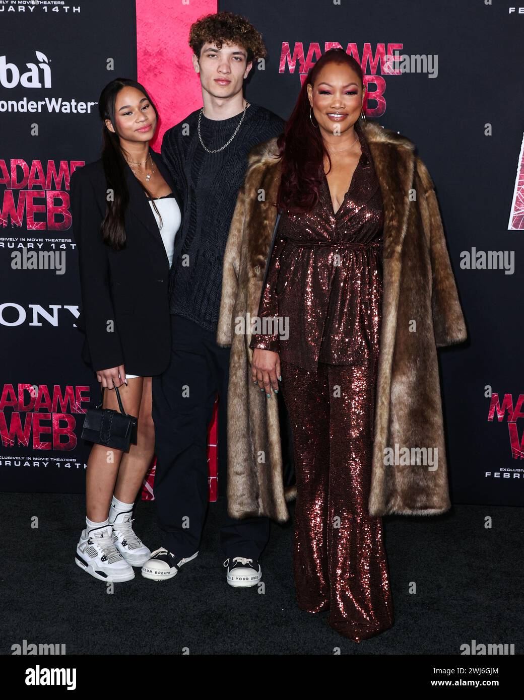 WESTWOOD, LOS ANGELES, KALIFORNIEN, USA - 12. FEBRUAR: Ashlyn Arnold, Jaid Thomas Nilon und Garcelle Beauvais kommen am 12. Februar 2024 in Westwood, Los Angeles, Kalifornien, an der World Premiere von Columbia Pictures 'Madame Web' an, die im Regency Village Theatre stattfindet. (Foto: Xavier Collin/Image Press Agency) Stockfoto