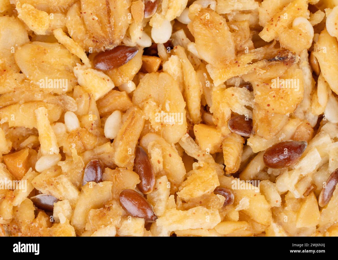 Müslikekse mit gesundem Getreide und Körnern in Honig Nahaufnahme unter dem Hintergrund Stockfoto