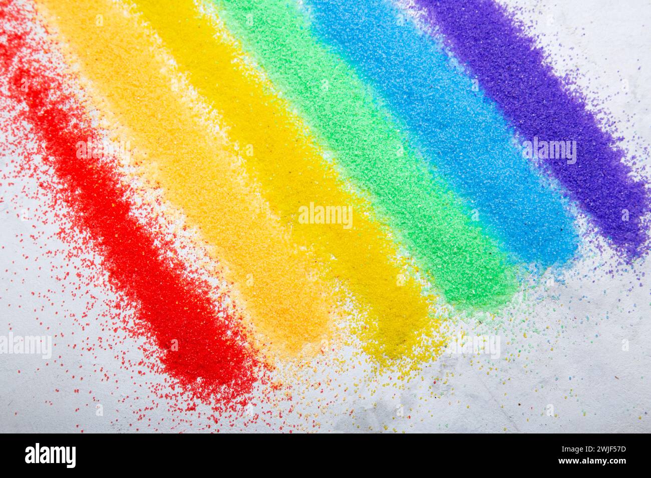 Bunter Sand, der kunstvoll für kreative LGBTQ-Menschen im Hintergrund verbreitet wird. Konzept der homosexuellen, schwulen Gemeinschaft, toleranten LGBTQ Gesellschaft Stockfoto