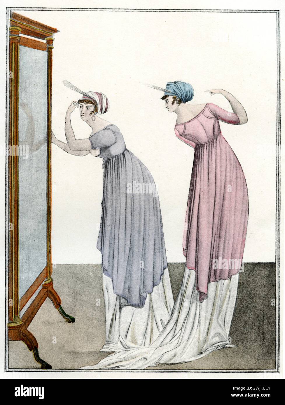 Zwei Frauen vor dem Spiegel. Aus Richtung Hamburg Journal of Fashion and Elegance, 1802, (Modegeschichte, 1925), zwei Frauen vor dem Spiegel. Aus: Hamburger Journal der Moden und Eleganz, 1802 Stockfoto