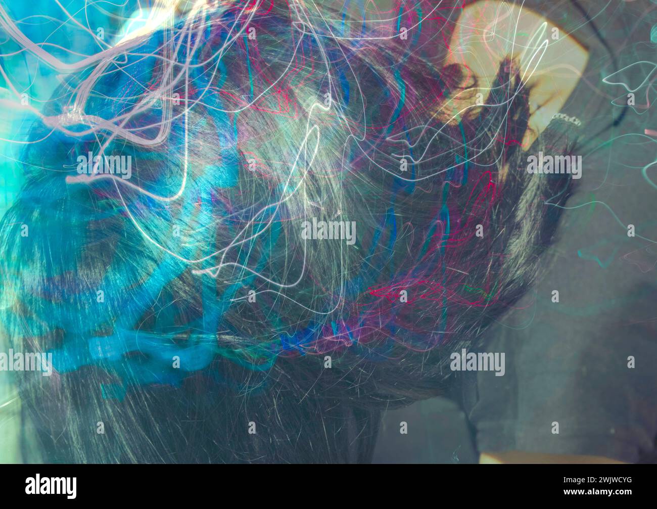 Das Haar einer Frau in einem abstrakten Bild, verwickelt und schön. Stockfoto