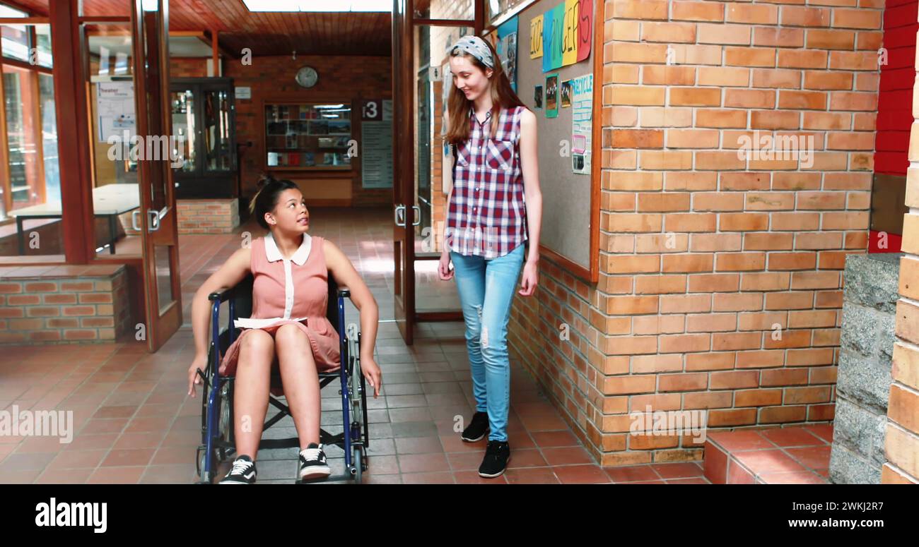 Bild von Lichtflecken über behinderten birassischen Studenten mit Freund Stockfoto