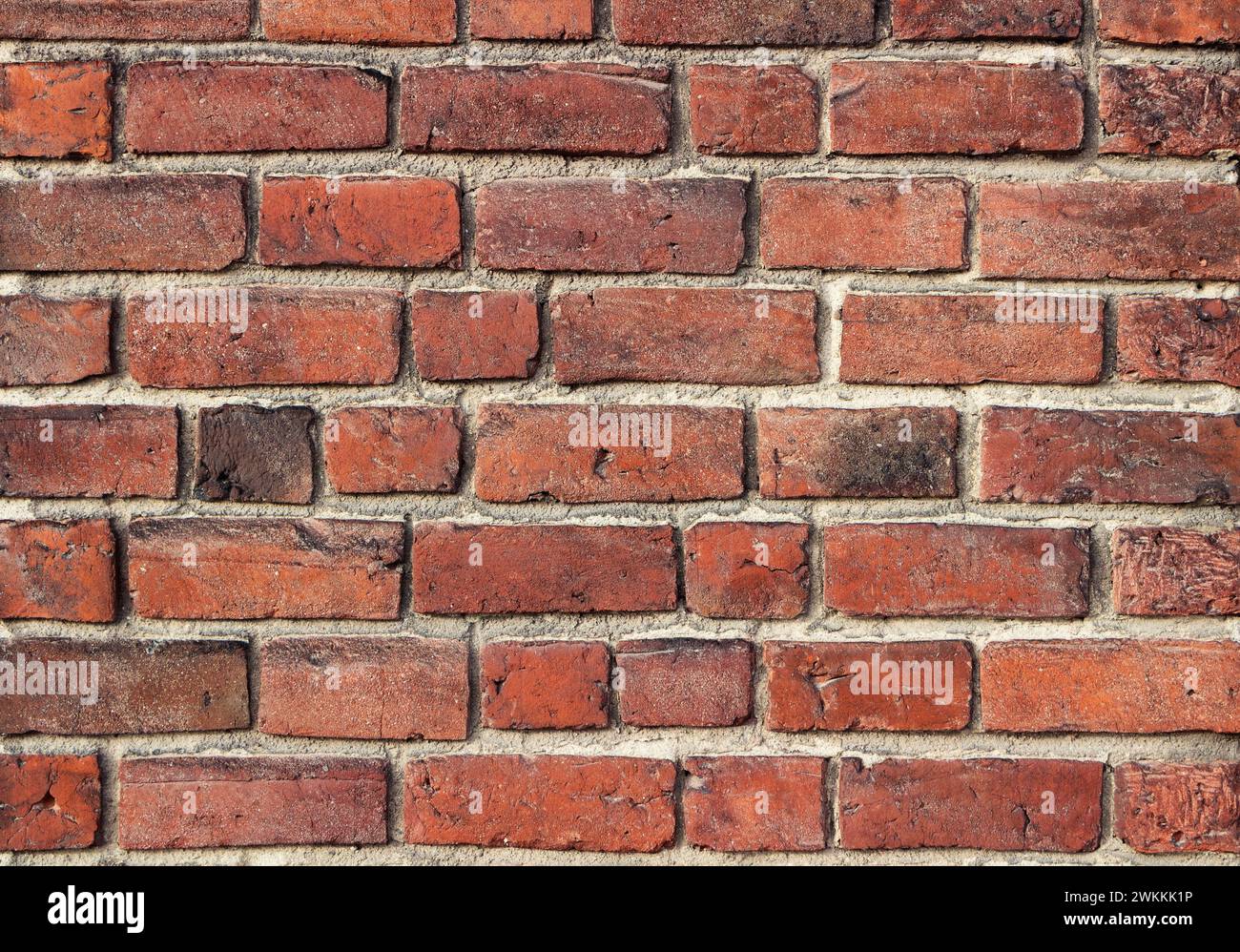 Textur einer alten alten roten Backsteinmauer. Nahaufnahme. Stockfoto